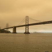 San Francisco Bay Bridge surrounded by smoke